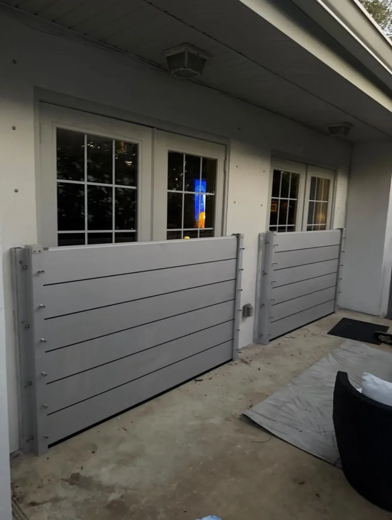 Custom-sized flood barrier panel at a door opening